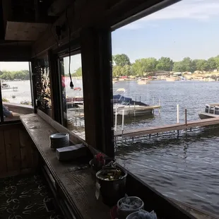 a view of a lake from a restaurant