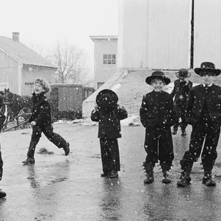Amish Children Playing in Snow, Lancaster, Pennsylvania, 1969 by George Tice
