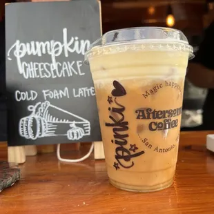 a cup of pumpkin cheesecake iced coffee