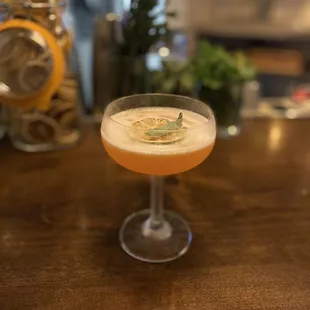 Enjoying an amazing cocktail "Red Coupe". Highly recommended if you like a mild refreshing cocktails. 10 's!