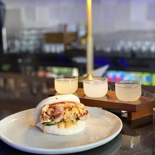 a plate of food and drinks