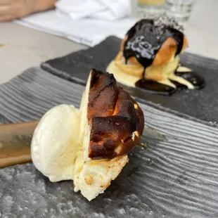 Cheesecake and profiterole dessert