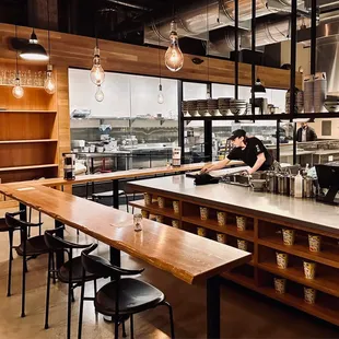 a kitchen with a counter and a bar
