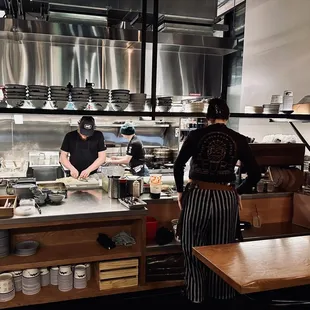 two people working in a commercial kitchen