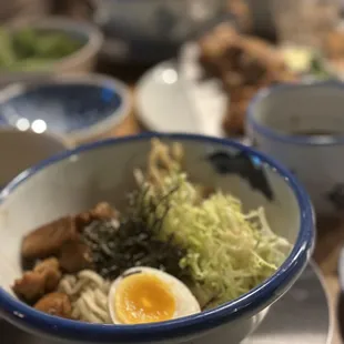 a bowl of ramen with a hard boiled egg