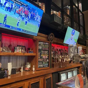 Long bar with large TV's up top