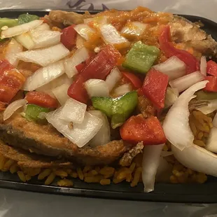 Jollof rice with fish and vegetables. Very good