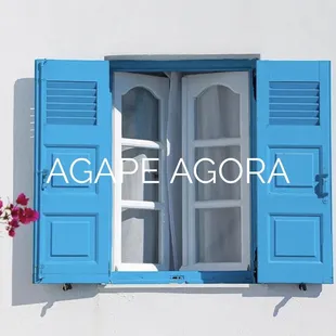 a window with blue shutters