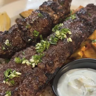 Beef Kebab &amp; Kefta Kebab Choose any two - 28 Served over rice &amp; vegetables.
