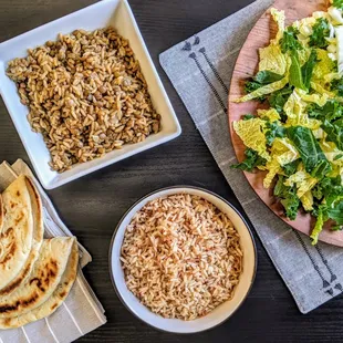 a salad, pita bread, and pita bread