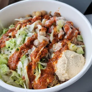 Half gyro half chicken shawarma bowl with lots of yummy toppings