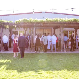 Our guests mingling outside before the ceremony.