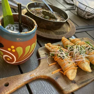 Empanadas del Mar, Piña Paloma, and Queso Fundido with Chorizo