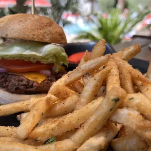 Impossible burger with French fries ($22, 6/2022)  Impossible Patty, Tomato, onion, Lettuce, Vegan American Cheese, Vegan Spread