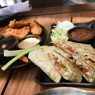 Chicken Quesadillas, Elote, Chicken Tenders, Plate of Fries