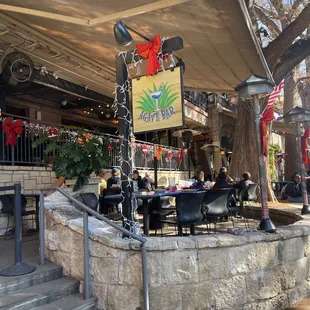 outdoor seating area with tables and chairs