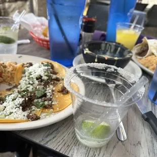 Cold street tacos and tiny margarita, Texas size lol.