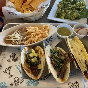 3 taco lunch with beans and rice. Very good. They have many different tacos you can choose from. Yummy