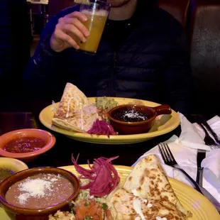 Quesadilla, refried beans, and Mexican rice