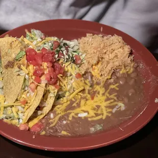 Hard tacos with rice and beans