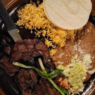 Carne asada entree with corn tortillas