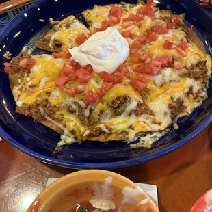 Mexican Pizza, Queso Blanco, house made salsa with corn tortilla chips