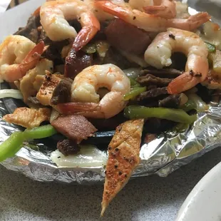 a plate of shrimp and asparagus