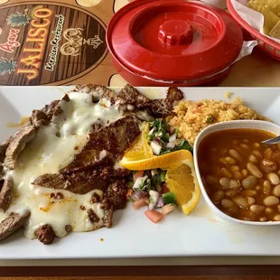 #32 fajita steak topped with chorizo and queso blanco