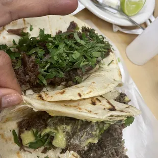 My tacos were soooo good I couldn't wait before biting one!!! Not fatty at all and the green salsa was fabulous and perfectly picoso