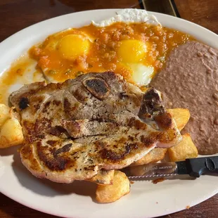 Pork chop and egg breakfast