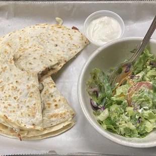 Steak Quesadilla  with salad .
