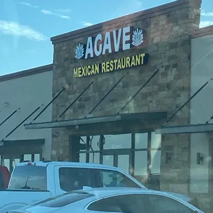 a car parked in front of the restaurant