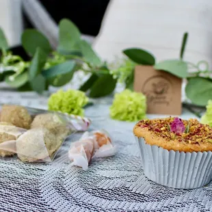 a muffin and a cupcake on a table