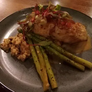 Roasted Chilean sea bass with mushroom risotto and grilled asparagus ($52)