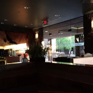 a view of a dining room from the kitchen