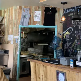 a man standing in front of the counter