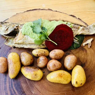 Whole Chilean Sea bass with roasted potatoes