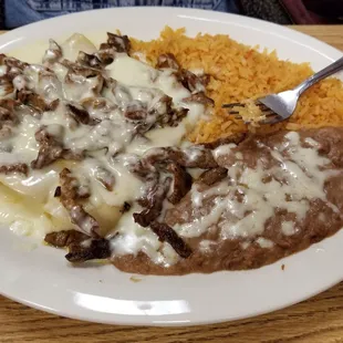 Steak enchiladas loco