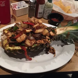 Piña loca - I'd asked for no cheese or queso, but under this deliciousness of meats and peppers, it was swimming in queso.