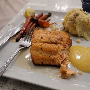 Salmon,  mashed and carrots. Delicious . Too bad they charge  $1.00 extra for sauce. Come on now! Just portion less.
