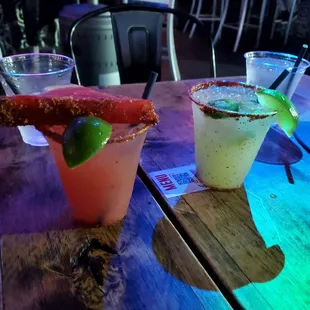 two margaritas on a table