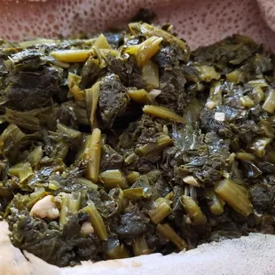 Gomen ($10), vegan by default. Nicely done collard greens. Not overcooked.