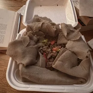 Beef Tibs served on Injera