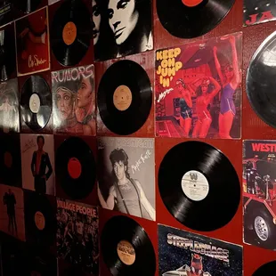 a wall of vinyl records