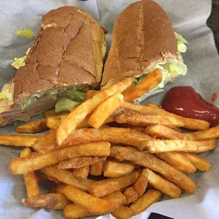 Turkey sub on wheat with seasoned fries