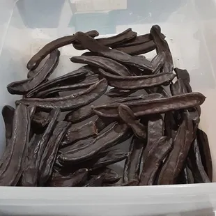 a container of chocolate beans