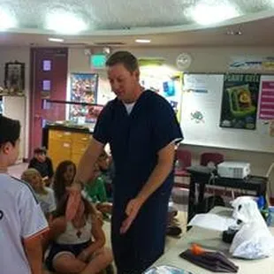 Mark teaching 4th graders what a Physical Therapist is..... and doing  "the robot"