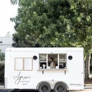 a man in a coffee truck