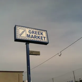 a blue and white sign