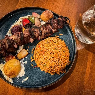 Shashlik : A beef sirloin skewer served with agora orzo and grilled seasonal vegetables, smoked yogurt